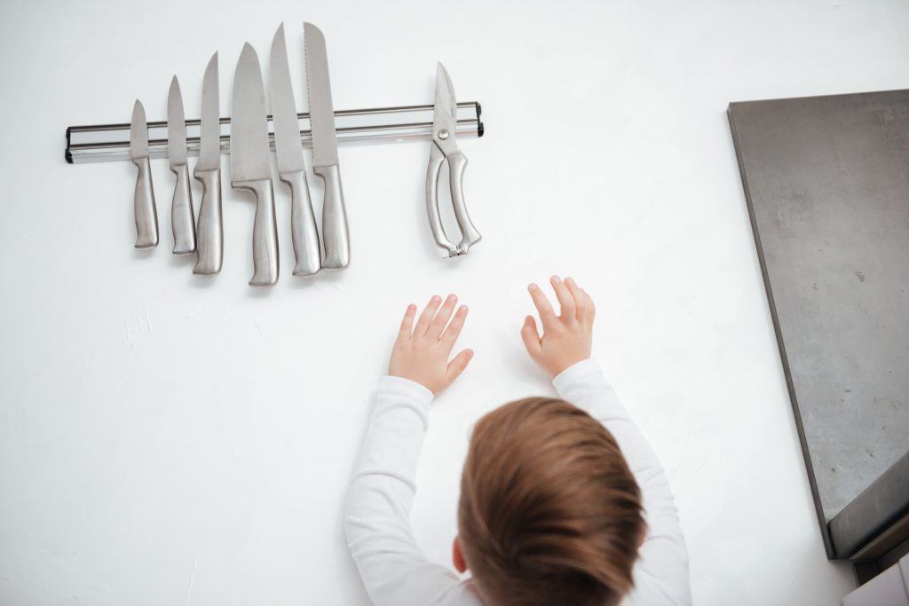 graphicstock dangerous situation in the kitchen child is trying to get a kitchen knife BOXBZYcL3e